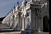 Myanmar - Mandalay, Kuthodaw Pagoda. 729 white pitaka pagodas contain the Tipitaka, the sacred texts of Theravada Buddhism. 